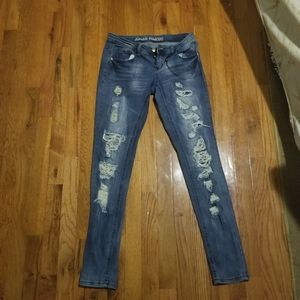 Distressed dark washed jeans